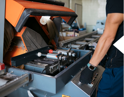Man using metal cutting equipment