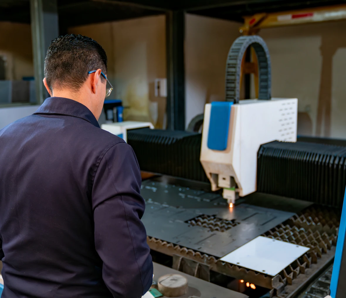 Laser cutter in action at workshop